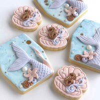 Clam shell impression stamp with matching cutter